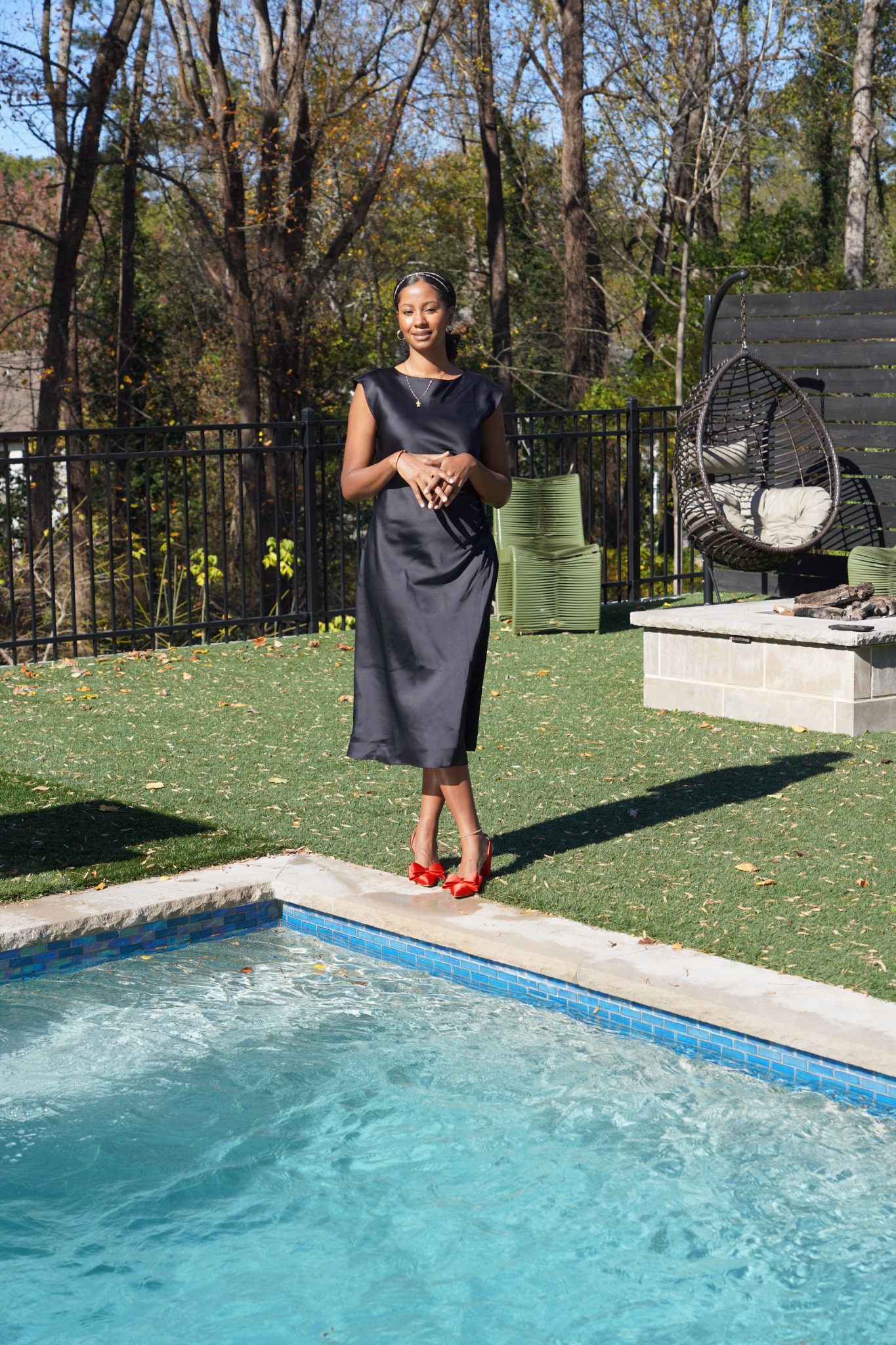 Kevia outdoors beside a pool